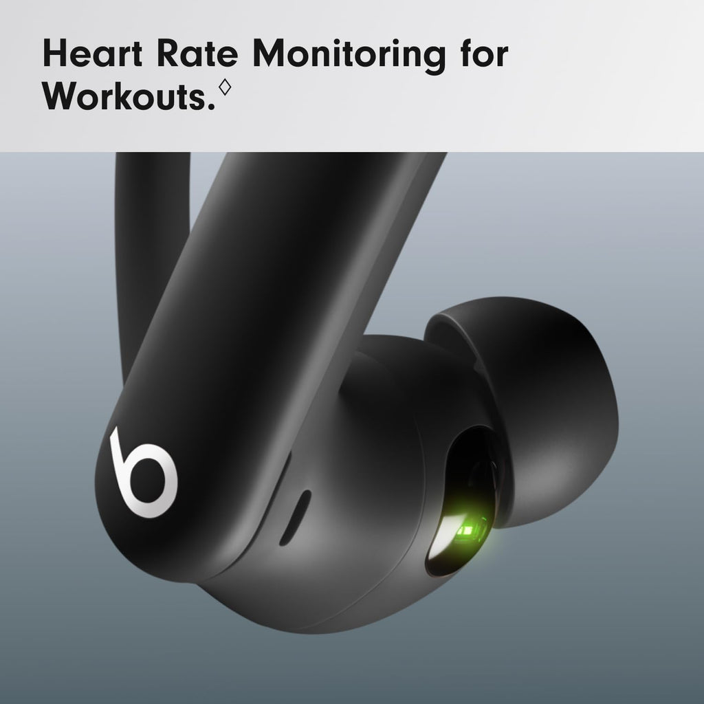 Black wireless earbuds with heart rate monitoring feature on a gray background