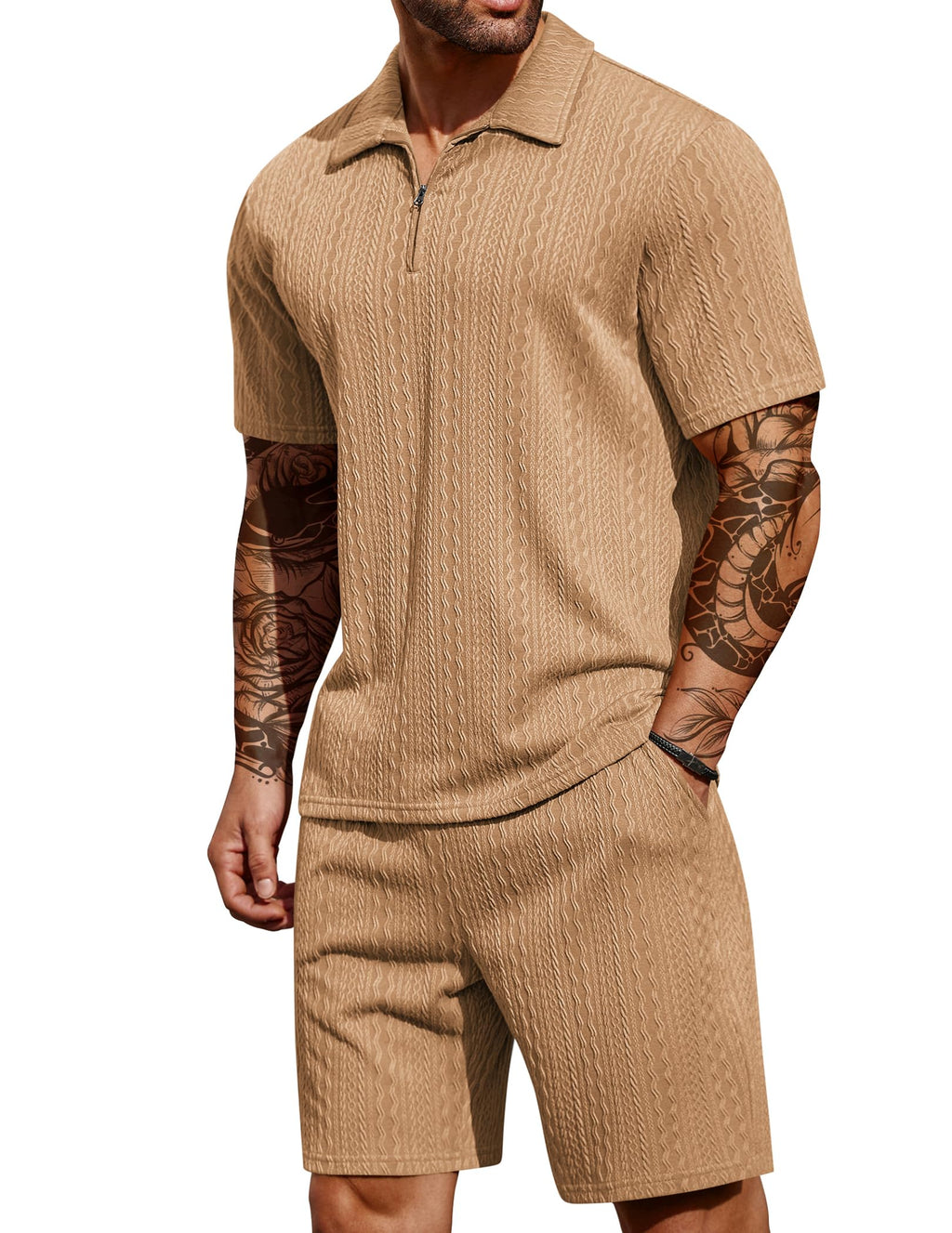 Man wearing a beige knit polo shirt and shorts set on a white background