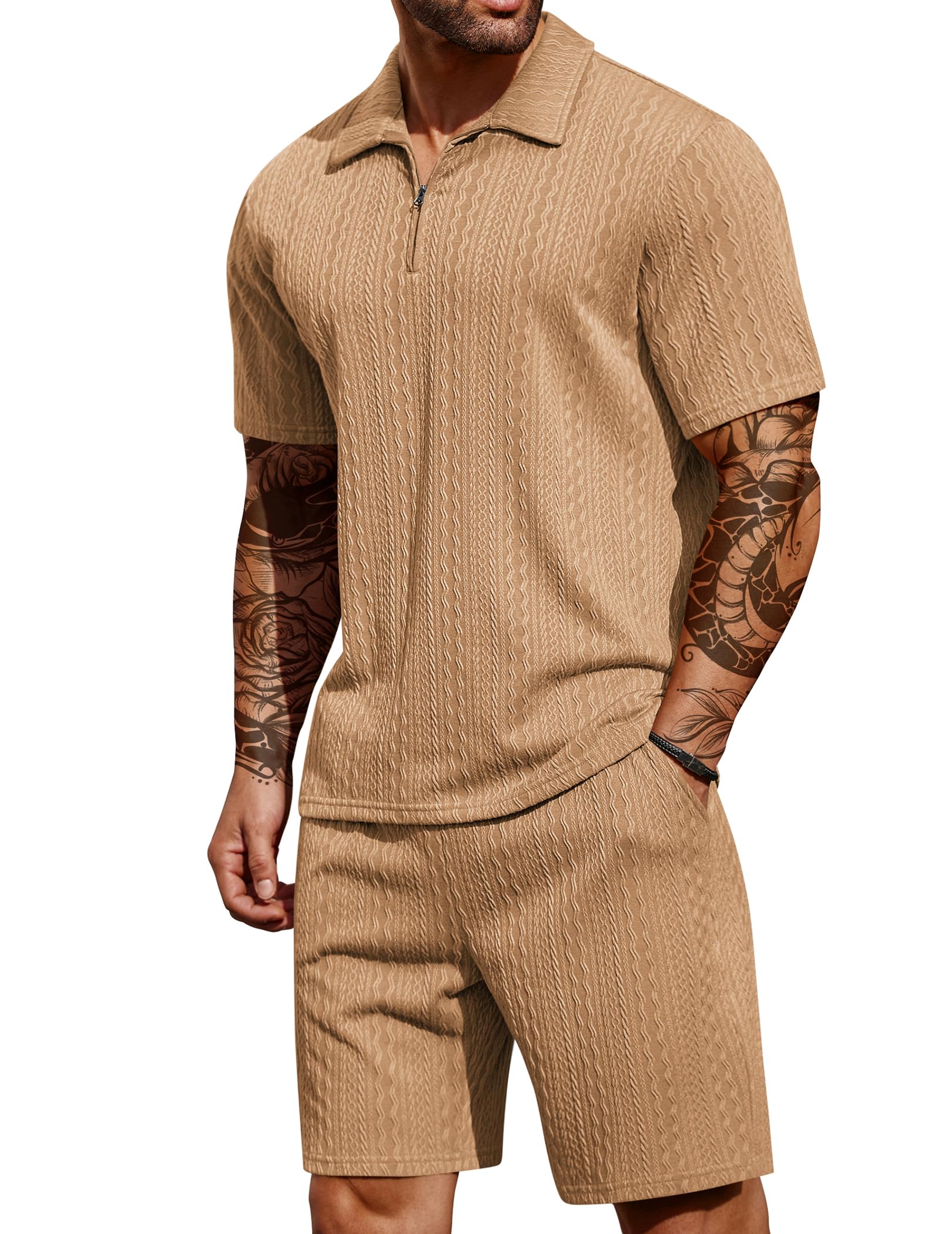 Man wearing a beige knit polo shirt and shorts set on a white background