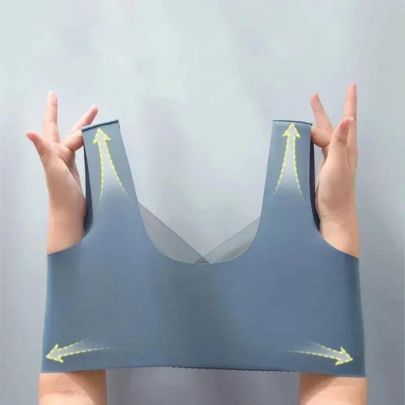 Gray sports bra held up against a light gray background
