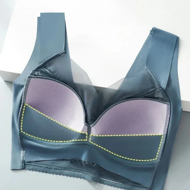 Blue bra with mesh panels on a white background