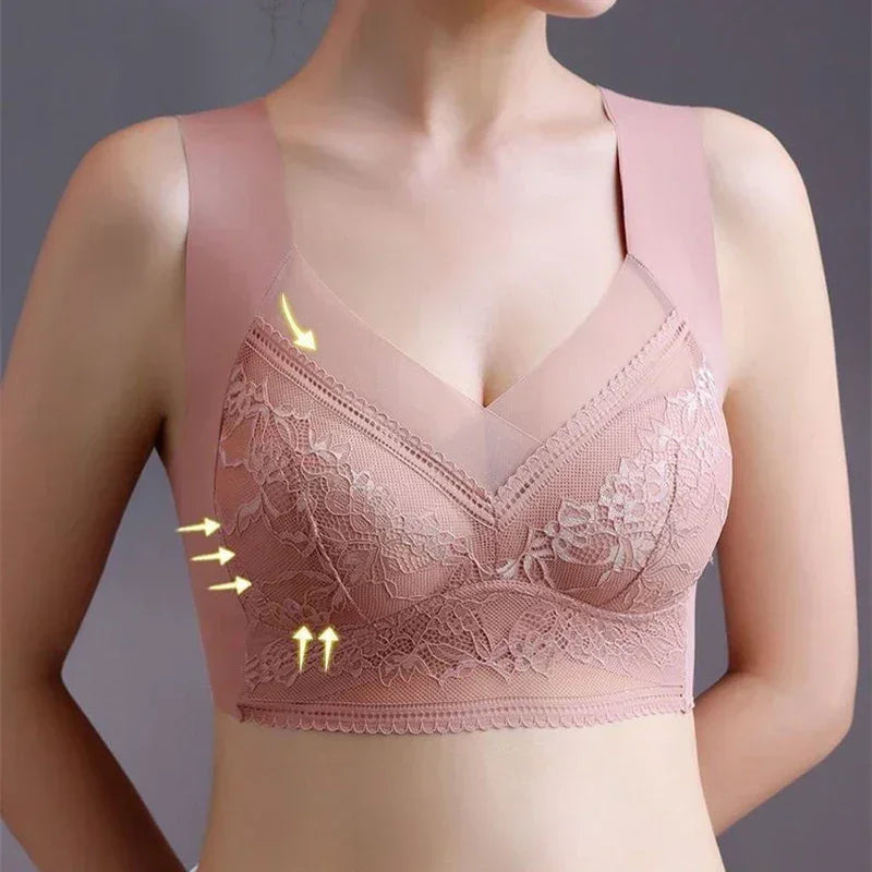 Pink bra with lace details on a gray background